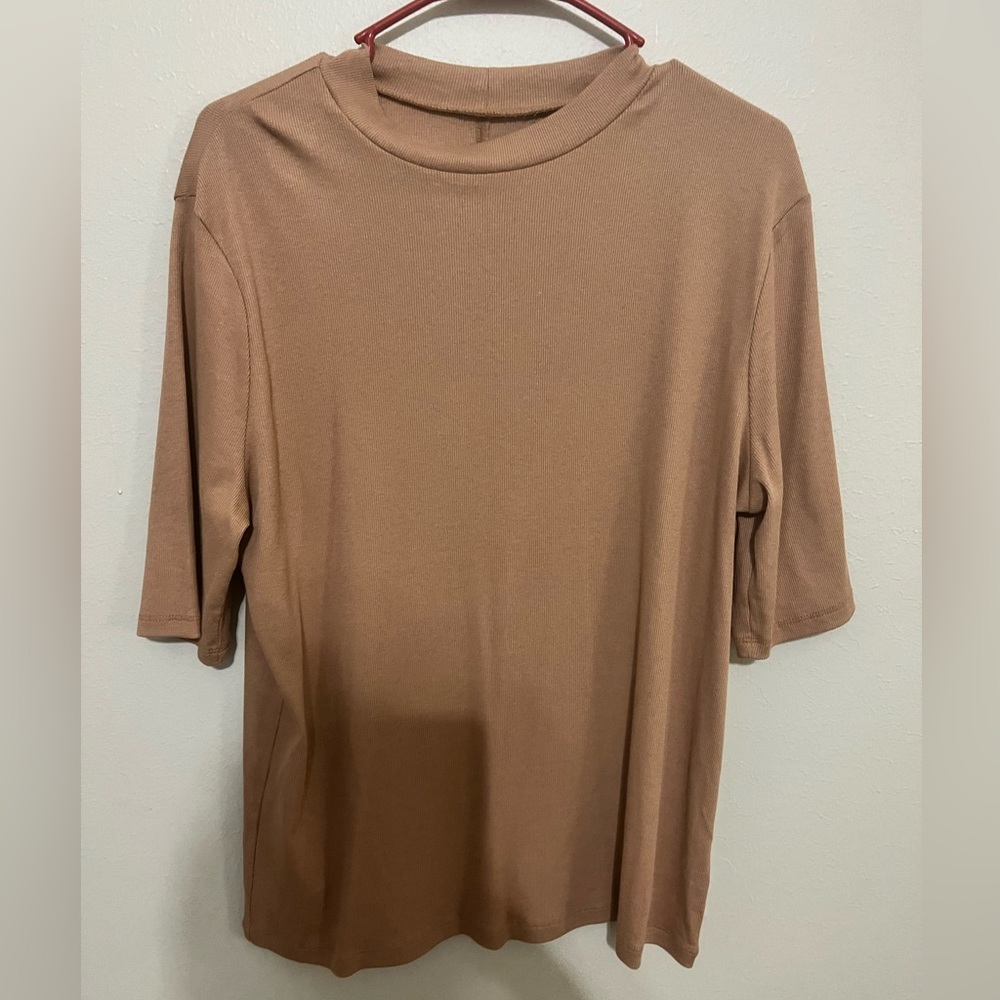 Women’s XXL shirt in color beige. Never used.